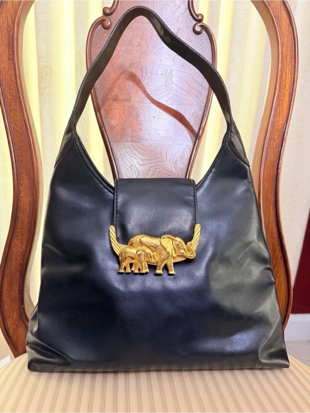 VINTAGE SASHA Black Leather Shoulder Bag with Gold Elephant Accent
